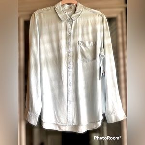 Long sleeve, bottom down. Soft blue.